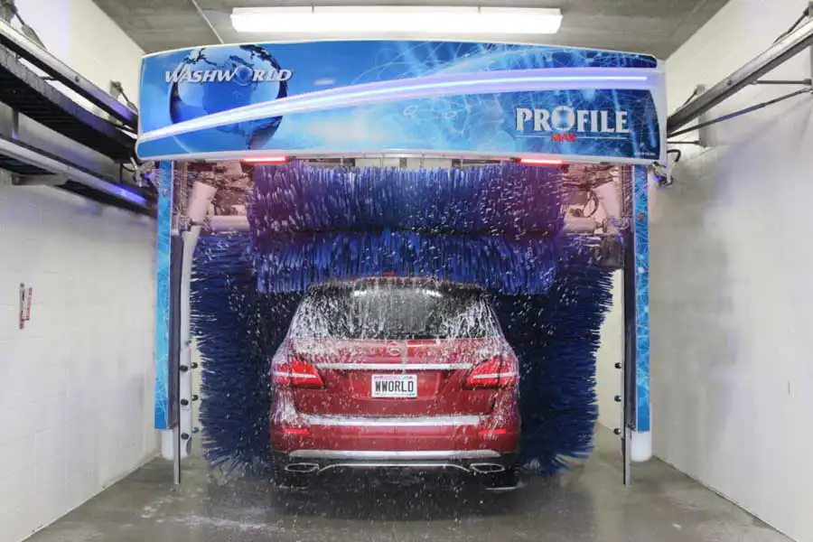 Red SUV under Profile car wash