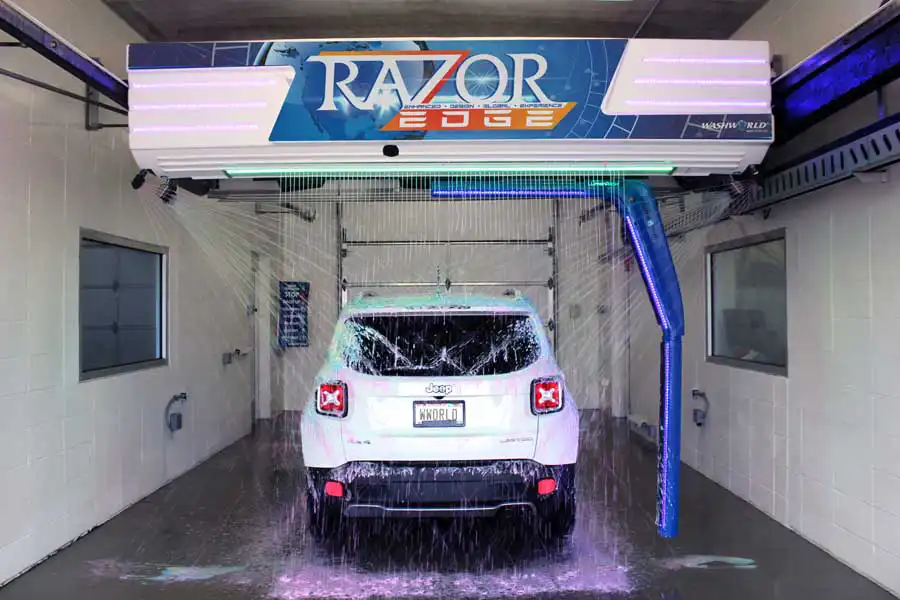 White Jeep under Razor EDGE car wash